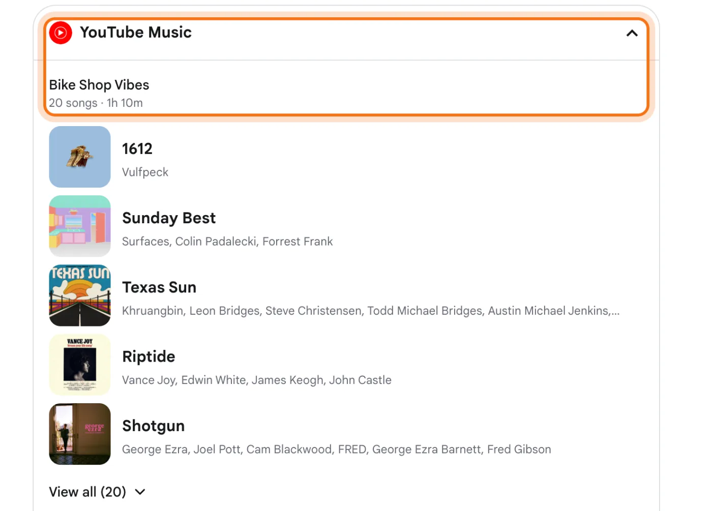The YouTube Music card in AI Mode, its top marked: Bike Shop Vibes, 20 songs, 1h 10m. Under it, five songs, from 1612 by Vulfpeck to Shotgun by George Ezra, and View all (20).